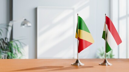 FLAGS OF CONGO R AND HUNGARY ON TABLE