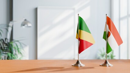 FLAGS OF CONGO R AND NIGER ON TABLE