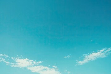 Clear sky with no clouds, vibrant blue tones stretching endlessly, evoking feelings of freedom and openness