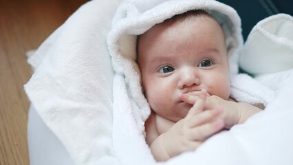 baby newborn close-up a portrait. happy family kid dream concept. newborn daughter girl 6 months swinging in a sun lounger. sweet cute newborn baby lifestyle. child baby kid portrait close-up
