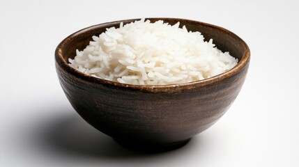 A bowl of white rice is sitting on a white background