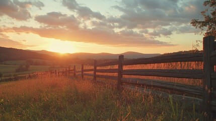 A dramatic sunset casting warm hues over a split-rail fence, with rolling hills in the distance, creating a peaceful and idyllic countryside scene.
