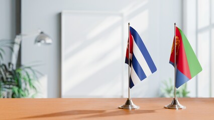 FLAGS OF CUBA AND ERITREA ON TABLE