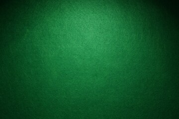 Green poker table as background, top view