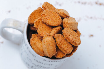 biscuits with coffee flavor, isolated on white background, in the glass