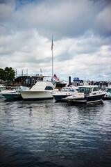 luxury yacht boats standing at yacht parking in water harbor