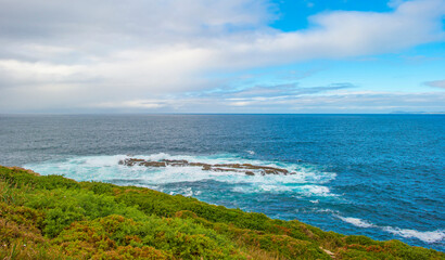 Wild shore with rocks and stones along the coast of northern Spain, Muxia, Galicia, September 12, 2024