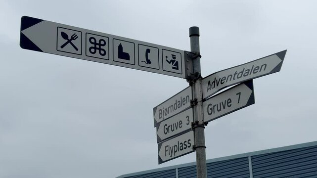 Longyearbyen, Svalbard, Spitzbergen, Norway - street direction sign to Gruve 3 & 7, Flypass, Adventdalen, Bjorndalen and other public places