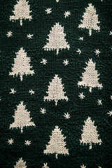 a sweater with a Christmas tree pattern