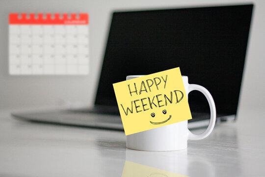 Happy weekend is shown using the text on the coffee cup