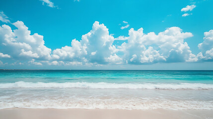 Fototapeta premium Beautiful sandy beach with a clear blue sky and turquoise sea water in the background, 