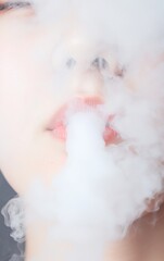 Close-Up of Teen Exhaling Vapor - Conceptual Stock Capturing Vaping Trend and Lifestyle Emotions