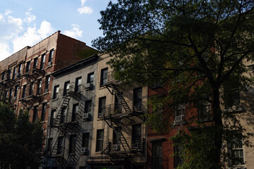 Row of Colorful Old Apartments and Residential Buildings along a Street in Chelsea of New York City