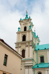 The old building of the Catholic Church. The building has a cultural and historical value. White walls and vaulted ceilings.