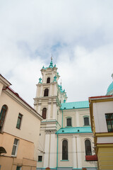The old building of the Catholic Church. The building has a cultural and historical value. White walls and vaulted ceilings.