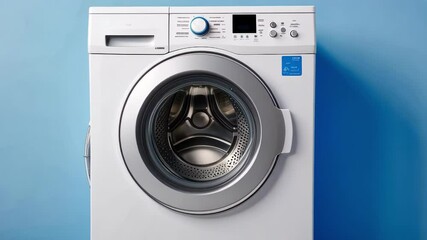 A modern washing machine against a blue backdrop, highlighting laundry efficiency and convenience in a domestic setting