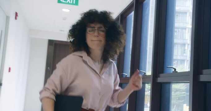 Beautiful happy Indian creative woman company worker dancing In office. Funny Happy beautiful business Indian woman Businesswoman Dancing In alone at office. 4K