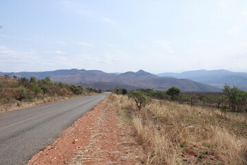 road with mountain in the background