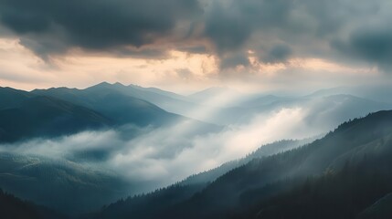 Obraz premium majestic mountain landscape with dramatic cloud formations ethereal light filtering through layers of mist aweinspiring natural scenery capturing raw beauty of wilderness