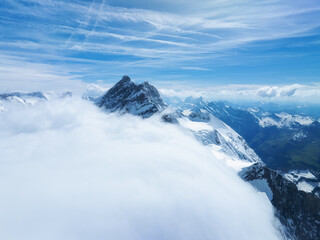 Aerial view of Jungfrau with clouds in winter