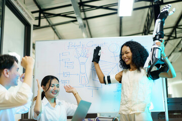 University students are discussing about the robotic project.