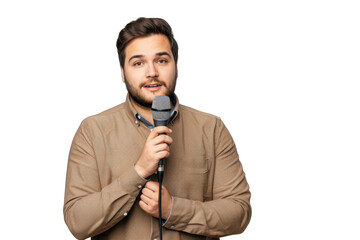 Naklejka premium Portrait of a young male influencer or singer, microphone in hand, his voice being recorded for a broadcast, isolated on a transparent background