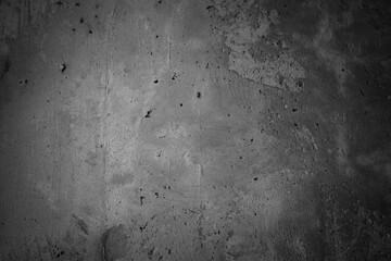 Black or dark gray rough grainy stone texture background
