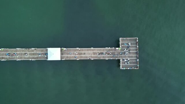 4k drone footage looking straight down on Juno Beach Pier in Florida, USA