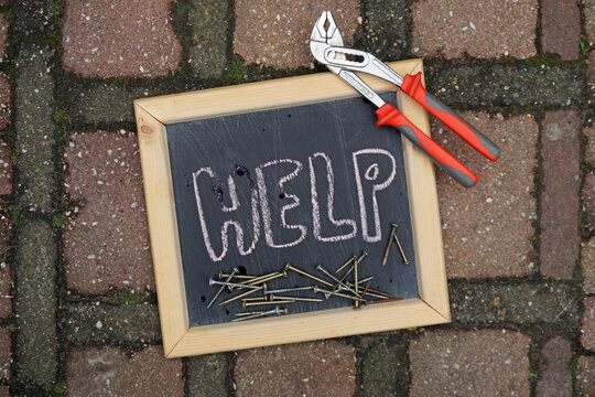 Help written on a chalkboard