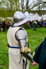 Knight fight, show fight of disguised knights and warriors, medieval soldiers with swords and shields at medieval market in Graefenthal Monastery, Goch, Kleve, North Rhine-Westphalia