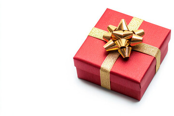 Obraz premium Red gift box wrapped with gold bow and ribbon isolated on white background