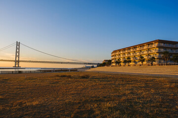 [HYOGO]Sunset view of Akashi Kaikyo Bridge, known as one of the world's largest suspension bridges,...