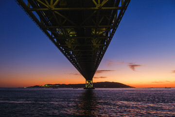 [HYOGO]Sunset view of Akashi Kaikyo Bridge, known as one of the world's largest suspension bridges,...