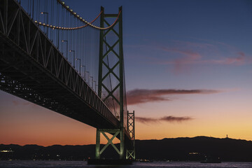 [HYOGO]Sunset view of Akashi Kaikyo Bridge, known as one of the world's largest suspension bridges, The view directly below the bridge with a beautiful contrast of the evening sky, Azur Maiko, Japan
