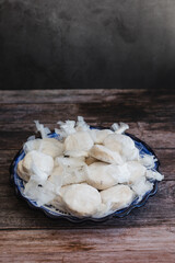Traditional Christmas polvorones, nevaditos, mantecados or sweet cookies on plate fot holidays