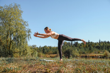 Workout. Fitness, outdoor workout in nature. Fitness, motivation for working  the gym, health improvement. Woman doing sports outdoors,wellness, Health, nature, fitness, eco-fitness. mental health.