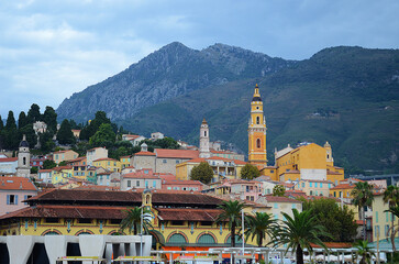 view of the old town with moutains in the background,
menton, france
