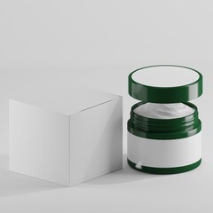 A green cosmetic jar with a white label is shown next to a closed white box. The lid of the jar is open, revealing a creamy texture inside. The minimalist design and clean background highlight.
