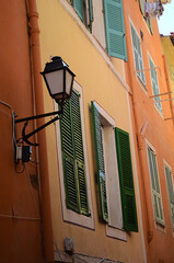 street lamp, building facade and shutters french style