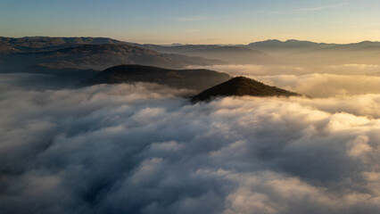 Aerial Dramatic Clouds on peak of Black Sea Region Mountains Stock Photo