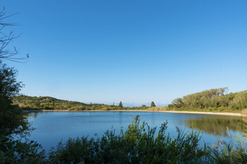Beautiful scenery by the artificial lake near Kavos, in the south of Corfu, Greece