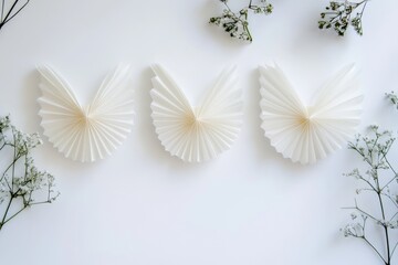 Obraz premium Minimalistic paper doves with flowers on white background, holiday decor 