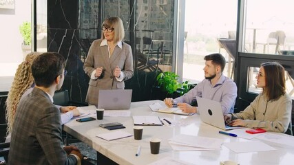 The business meeting was engaging and dynamic, fostering active collaboration among team members to significantly enhance teamwork and productivity