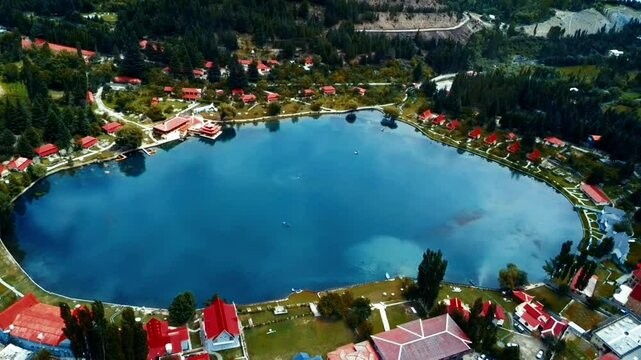 Aerial top view of heart love shape pond river lake in Karakoram high mountain hills. Nature landscape background, Skardu,Gilgit, Pakistan. Travel on holiday vacation.