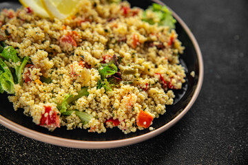tabbouleh vegetable bulgur couscous dish fresh delicious vegetarian and vegan food gourmet food background on the table rustic food top view copy space