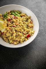 tabbouleh vegetable bulgur couscous dish fresh delicious vegetarian and vegan food gourmet food background on the table rustic food top view copy space