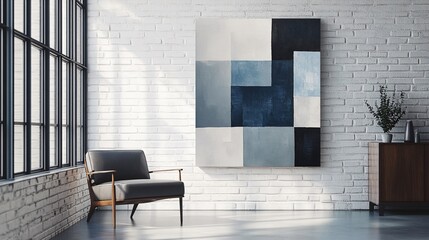 An abstract painting with geometric patterns in shades of grey and blue, hung on a white brick wall in a minimalist urban loft