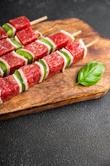 kebab raw meat vegetable pork, lard, pepper, vegetable dish fresh delicious gourmet food background on the table rustic food top view copy space