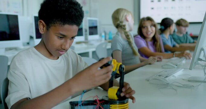 School Children in STEM Computer Classroom, Looking at Robot arm