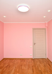 Pink walls in the interior of a living room